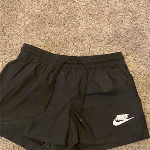 Women’s black Nike running shorts